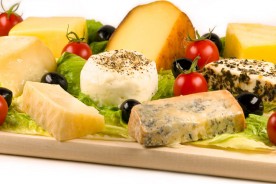 various cheeses on a cheese board